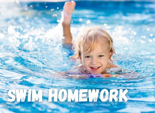Young child swimming in pool